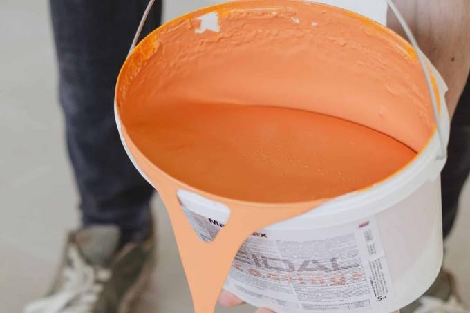 Liquid paint in the bucket