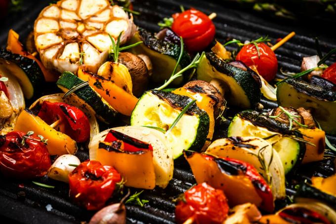 Vegetable skewers with herbs on the grill