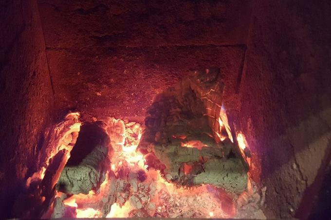 Natural stones in the oven with embers